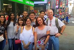smiling group in times square